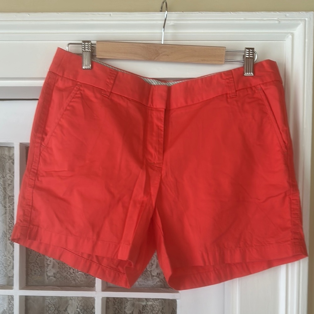 J Crew bright orange chino cotton shorts.  Size 8